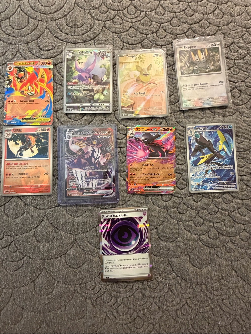 Pokemon Holo Card Set Featuring Red, Blue, Purple, Black and Gold Accents